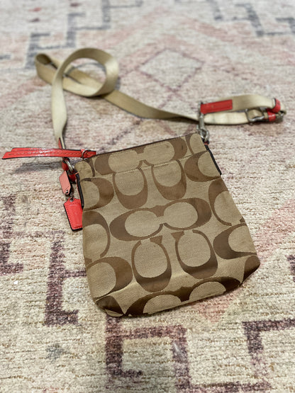 Faux Peach Coach Crossbody | From the Rack | Grace Thrifts