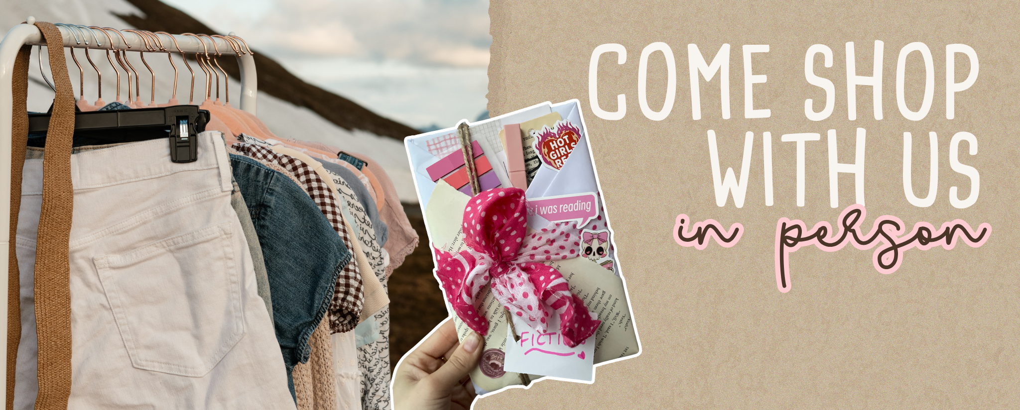 Clothing rack with various garments and a hand holding a pink hair bow with heart design, text 'Come shop with us in person' on a cardboard background.