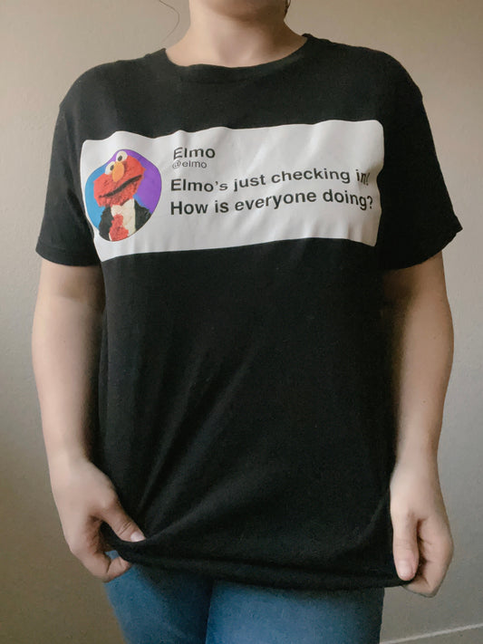 Elmo's Checking In Graphic Tee | From the Rack | Grace Thrifts