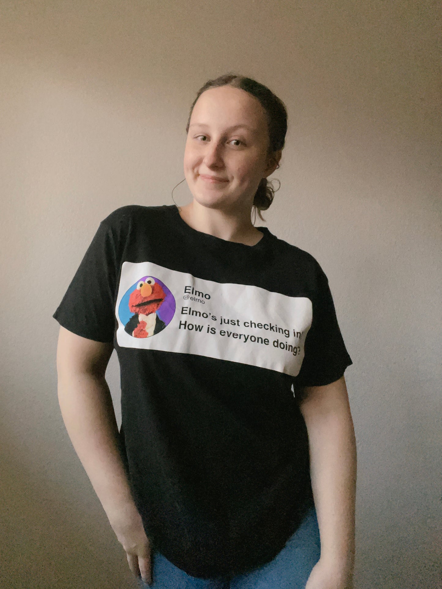 Elmo's Checking In Graphic Tee | From the Rack | Grace Thrifts