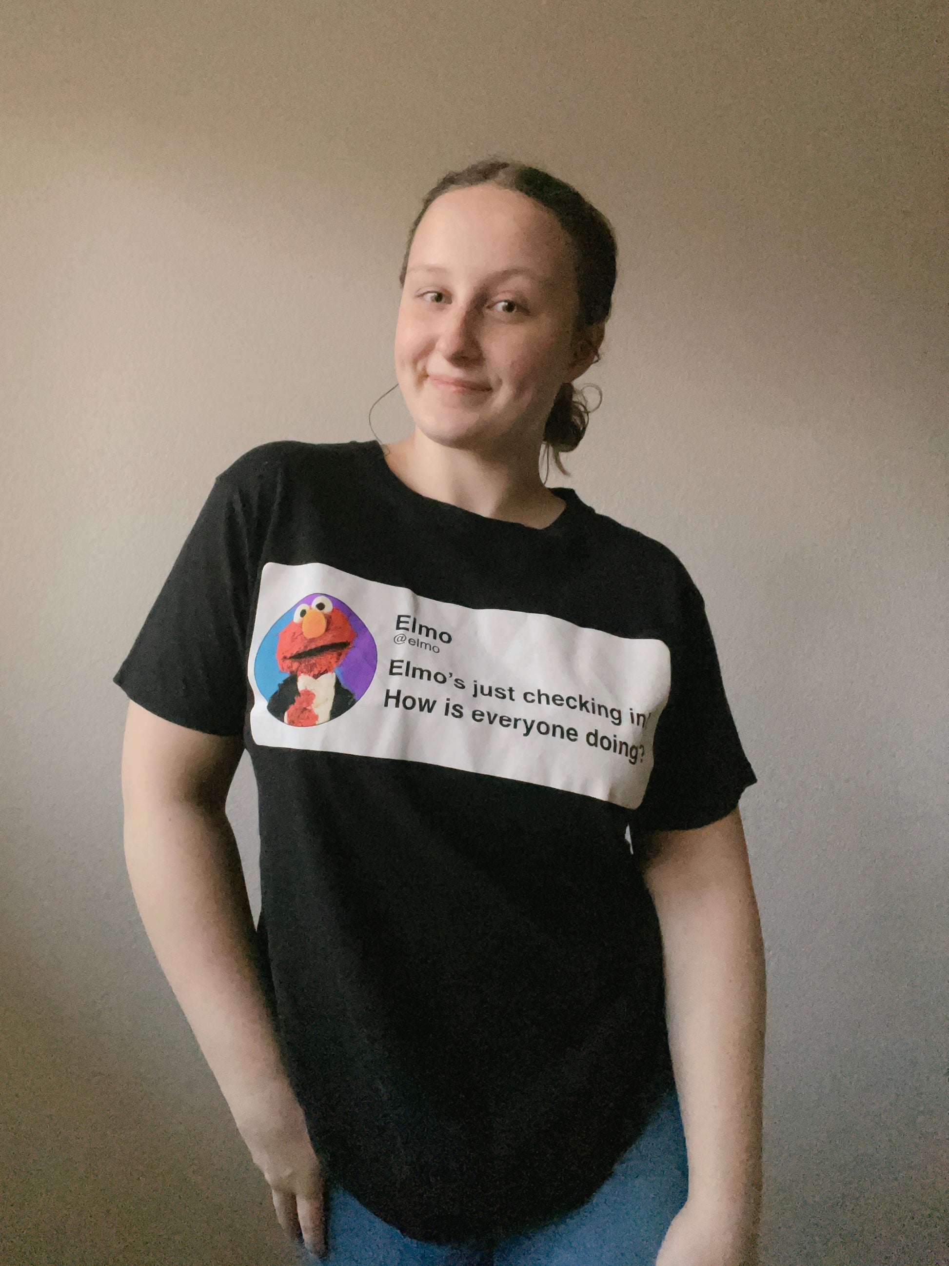 Elmo's Checking In Graphic Tee | From the Rack | Grace Thrifts