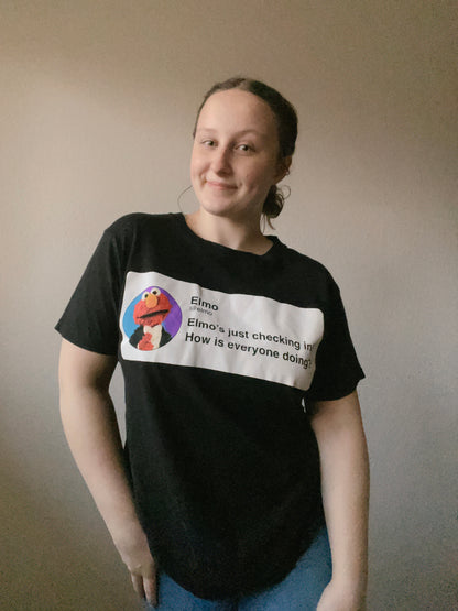 Elmo's Checking In Graphic Tee | From the Rack | Grace Thrifts