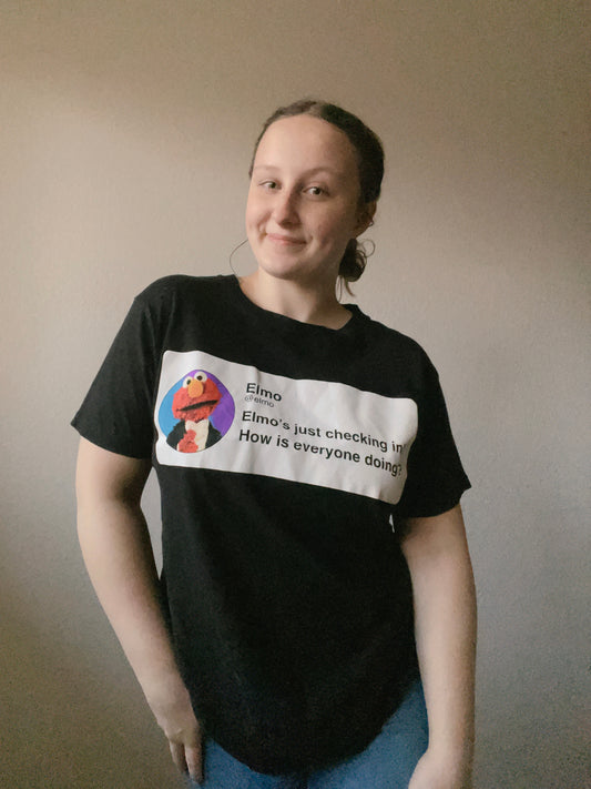 Elmo's Checking In Graphic Tee | From the Rack | Grace Thrifts